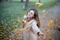 Happy woman in park